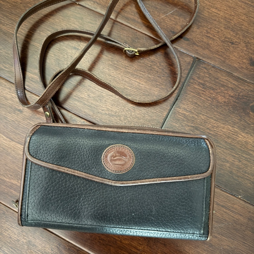Dooney & Bourke black and brown Leather wallet on a crossbody strap